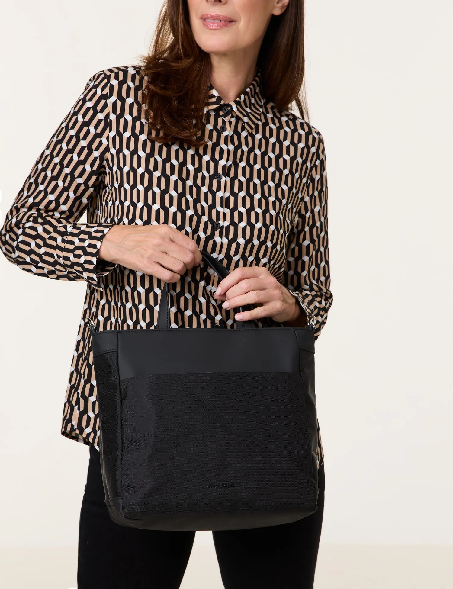 Handbag with a shoulder strap